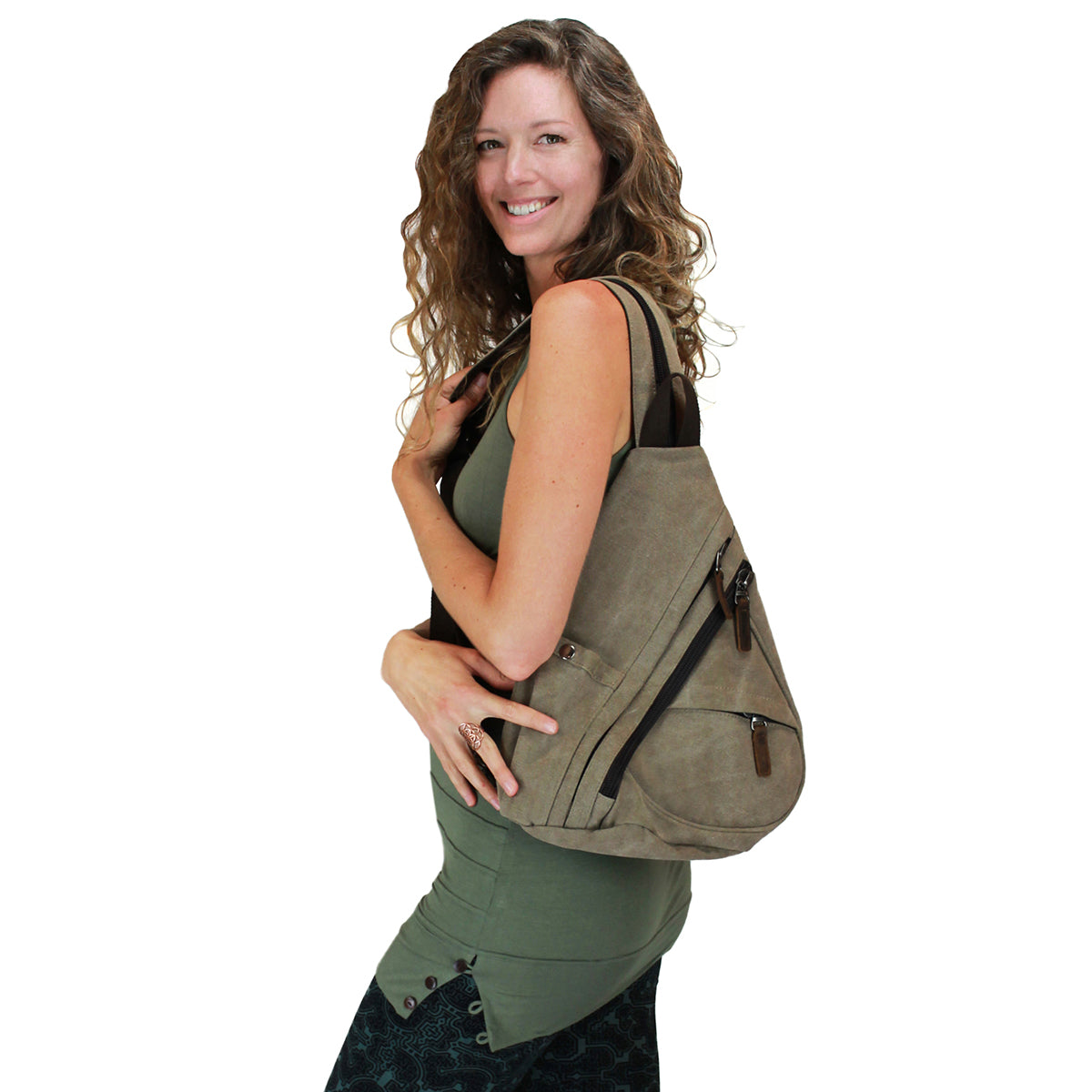 Sac à bandoulière "sling bag" en canevas de coton et cuir