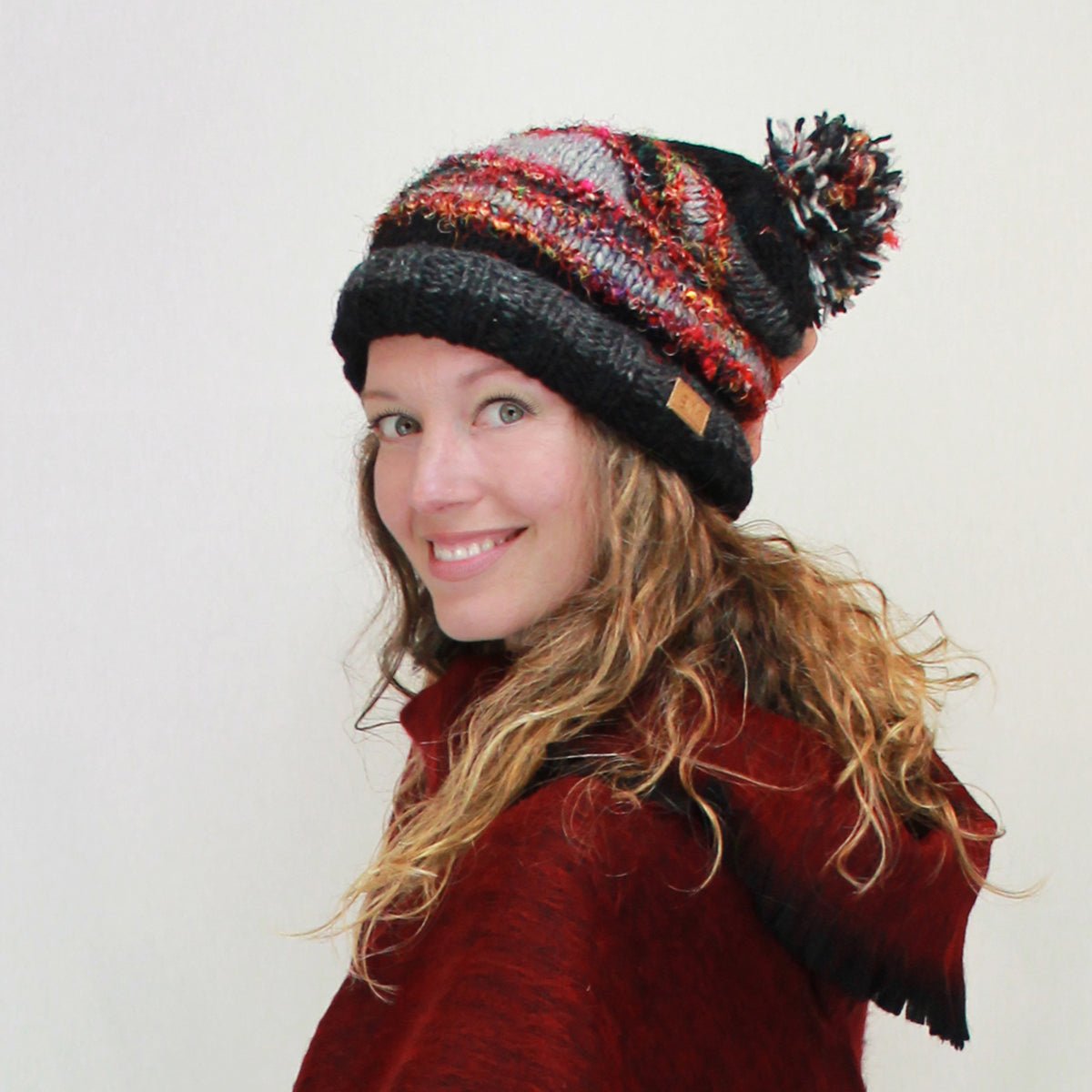 Tuque en laine à pompon avec soie recyclée