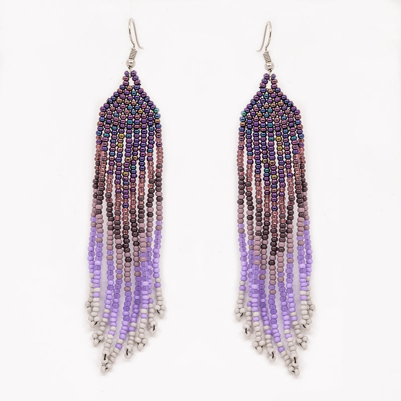 Boucles d'oreille perlées.